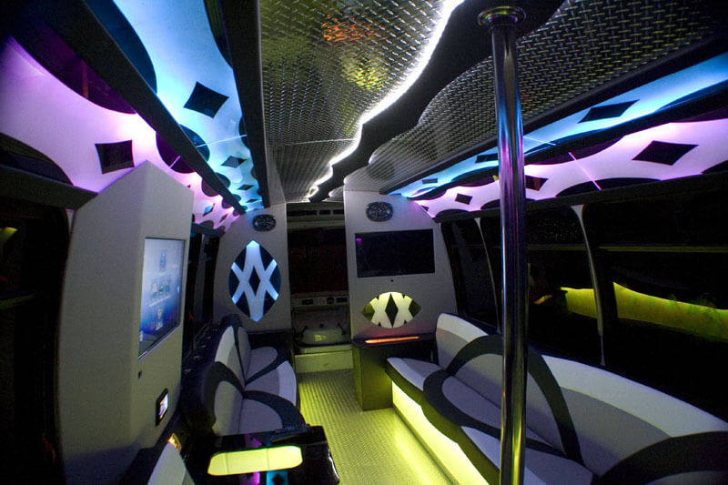 Dance flooring and stripper poles on party bus